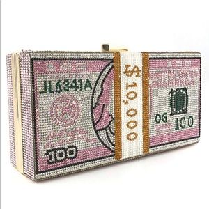 Women’s Dollar Bill Blinged out clutch in pink.
